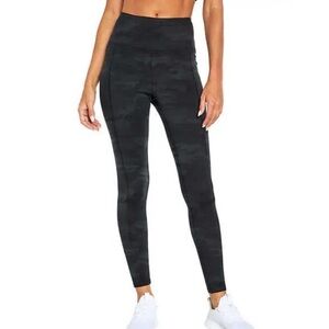 NWT. *Marika Ladies High Rise Tight with Pockets.   Size Small.